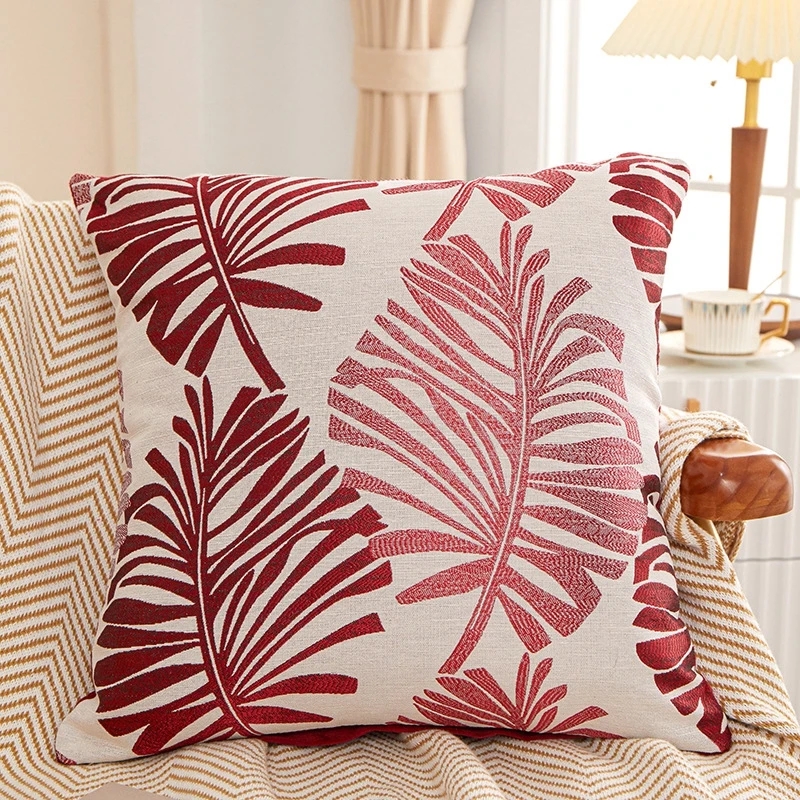 motif raffiné coussin brodé