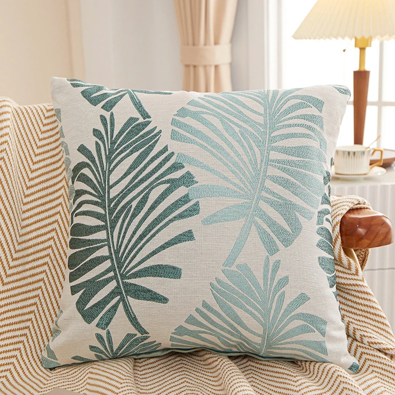 détente avec coussin brodé